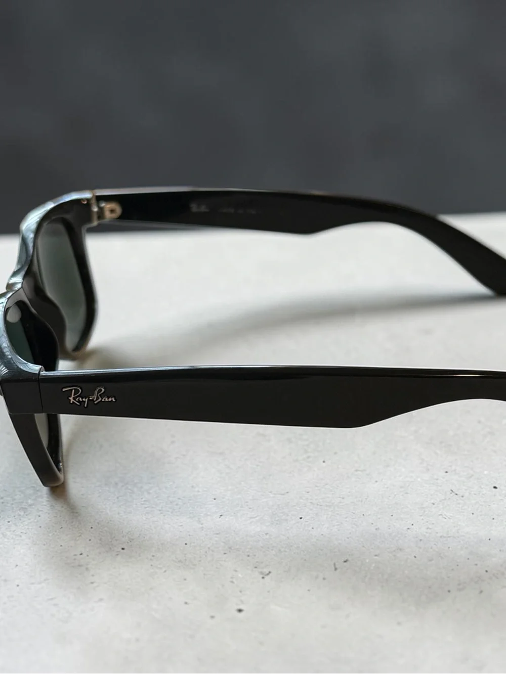 Ray-Ban Black Frame Sunglasses with Dark Lenses
